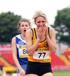 Jessie Knight (Surrey) wins the Senior Girls 400 metres.